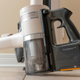 The A9 Kompressor+ gets part of its name from a mechanism that uses a sliding lever to compress dust and dirt in the bin so it can go longer between empties.